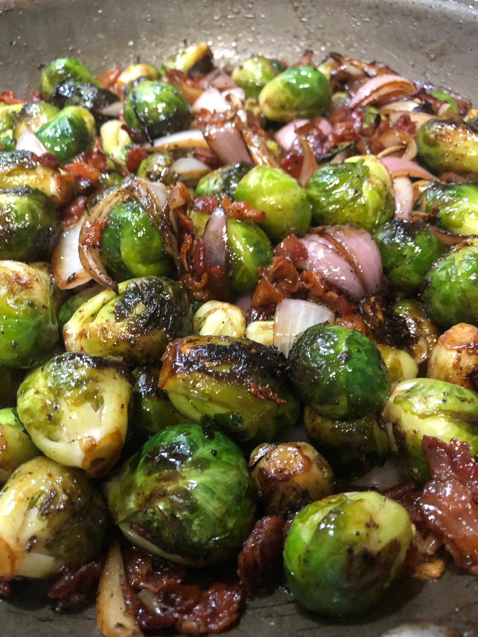 Roasted Brussels sprouts with sliced sausage