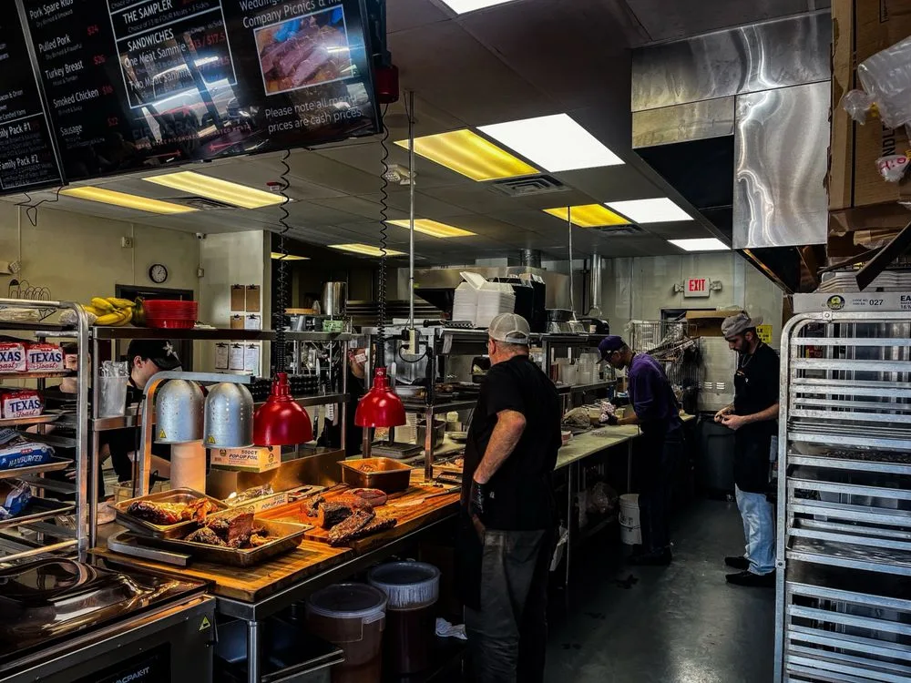 Fire Craft cooks working behind the kitchen counter
