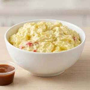 A bowl of Fire Craft mustard potato salad
