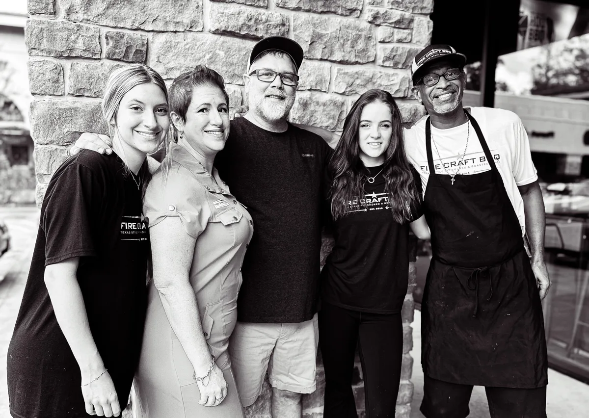 The Fire Craft team standing together outside the restaurant